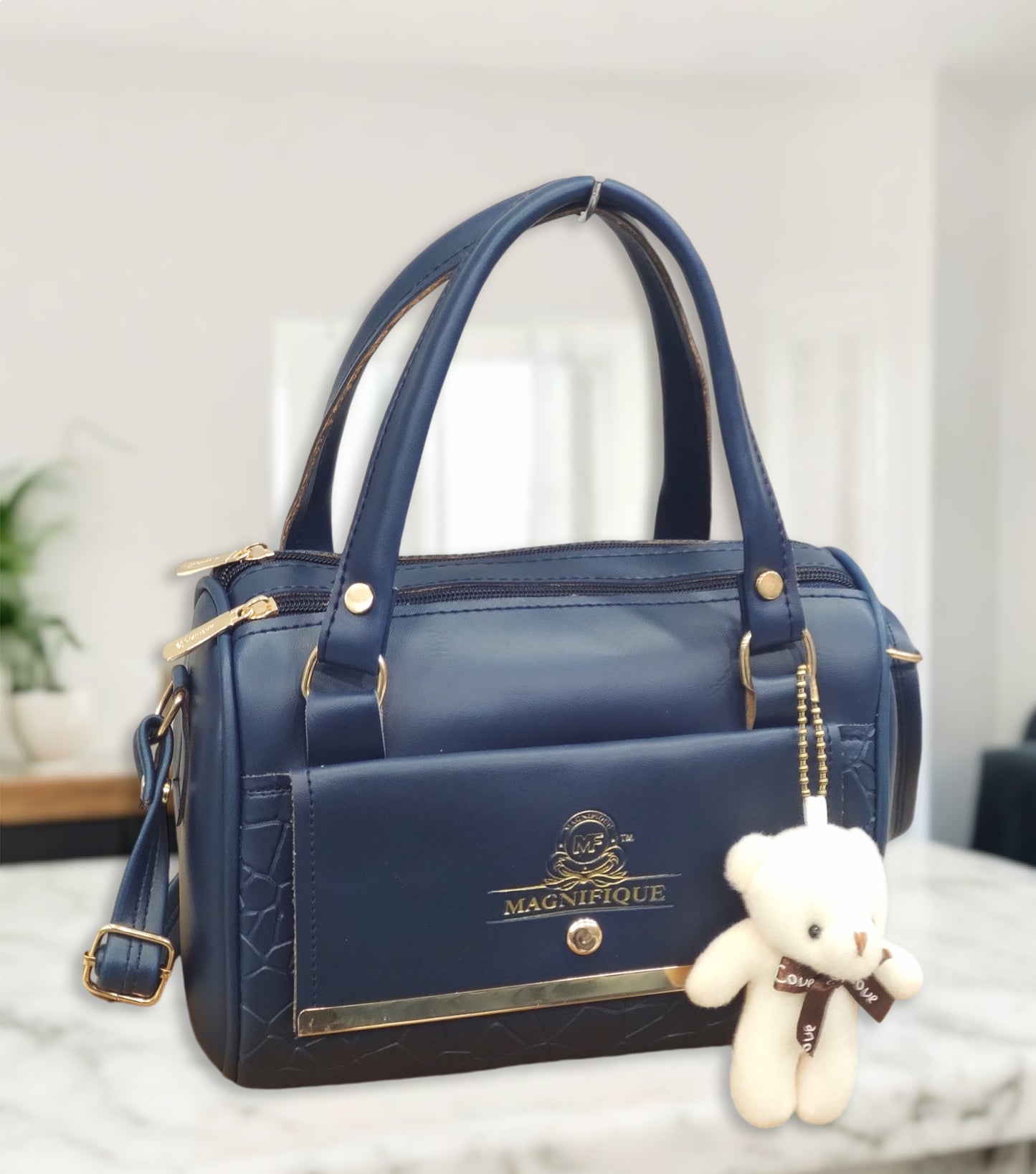 Magnifique Mini Duffle Style Sling Bag for Women with Keychain