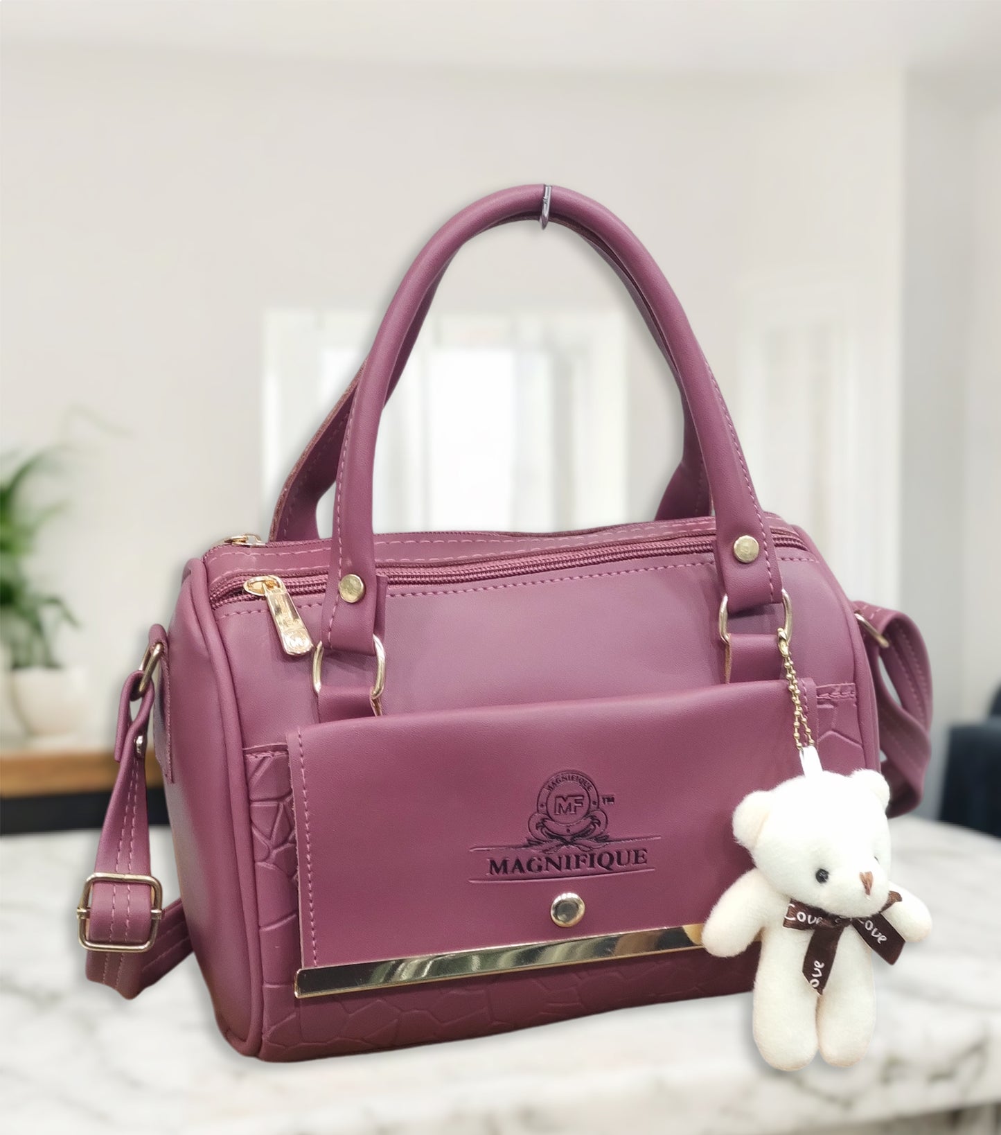 Magnifique Mini Duffle Style Sling Bag for Women with Keychain