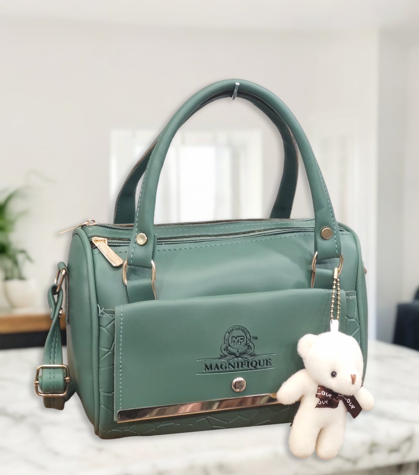 Magnifique Mini Duffle Style Sling Bag for Women with Keychain