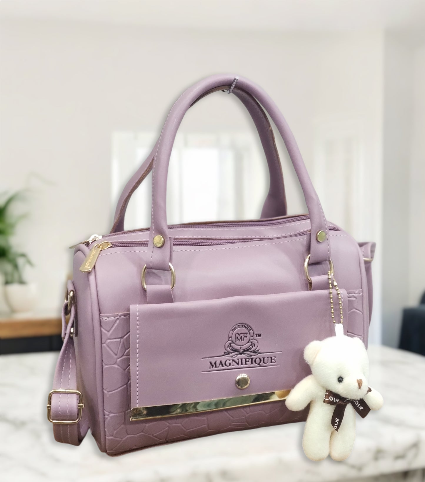 Magnifique Mini Duffle Style Sling Bag for Women with Keychain