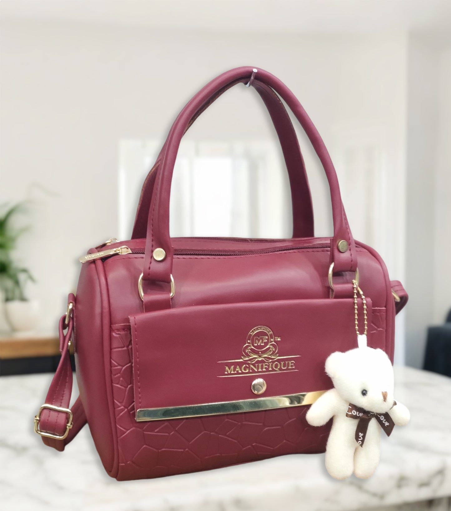 Magnifique Mini Duffle Style Sling Bag for Women with Keychain